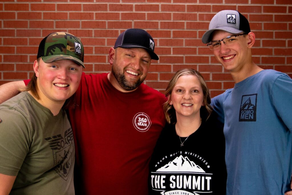 Jacob, Jason, Melissa, and Jayren Jacques (left to right) Missionary family laughing together